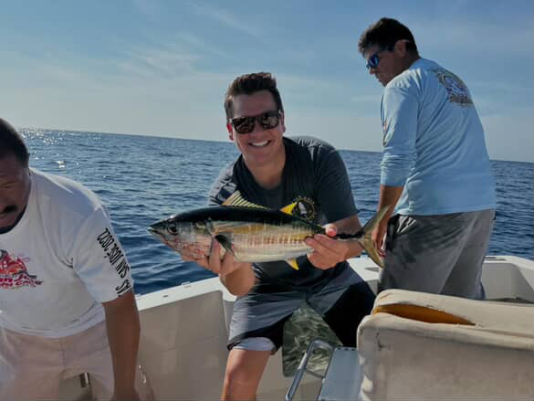 Clients celebrating multiple tuna landed near Gordo Banks