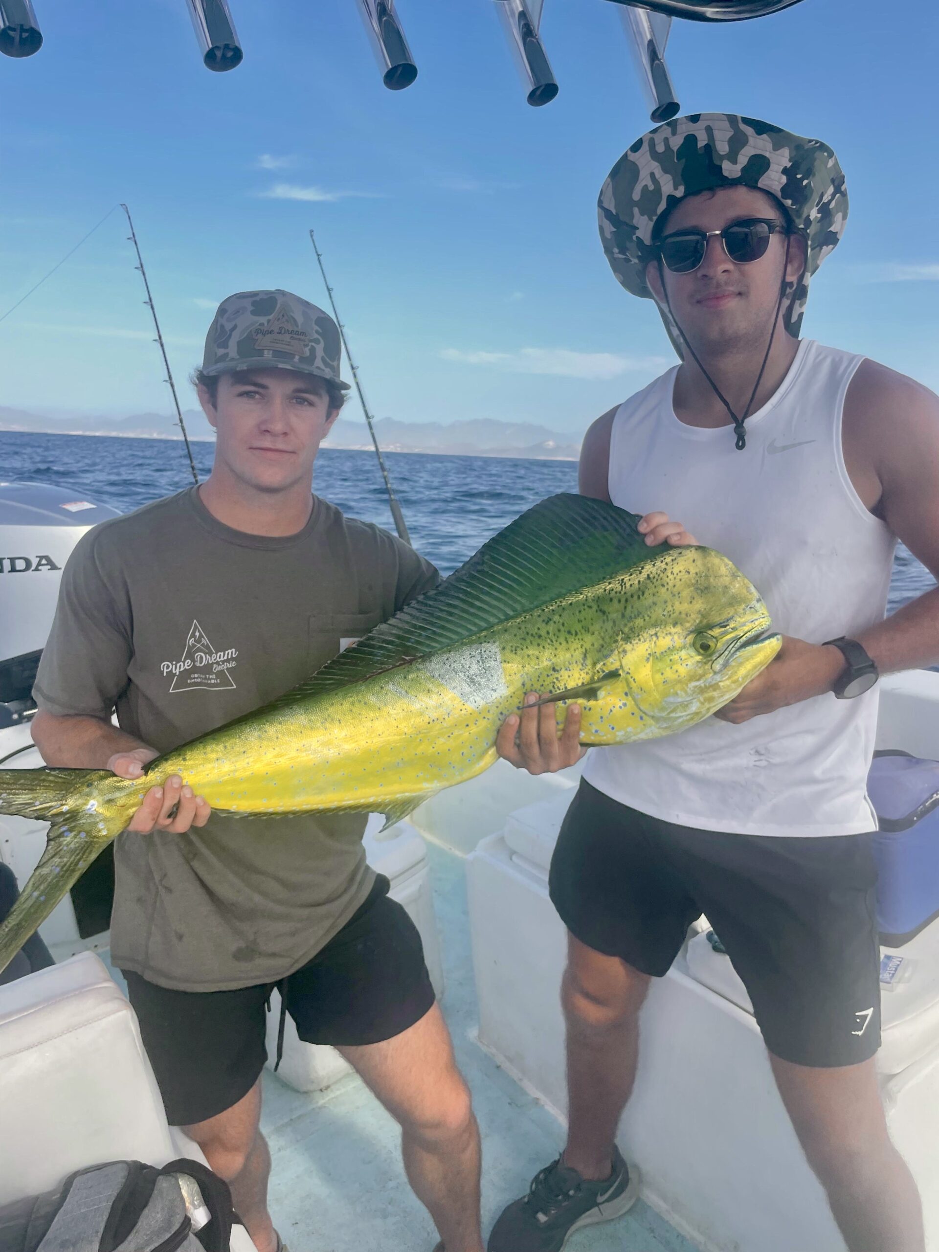 Happy anglers with mahi mahi at Puerto Los Cabos — San José del Cabo Fish Report