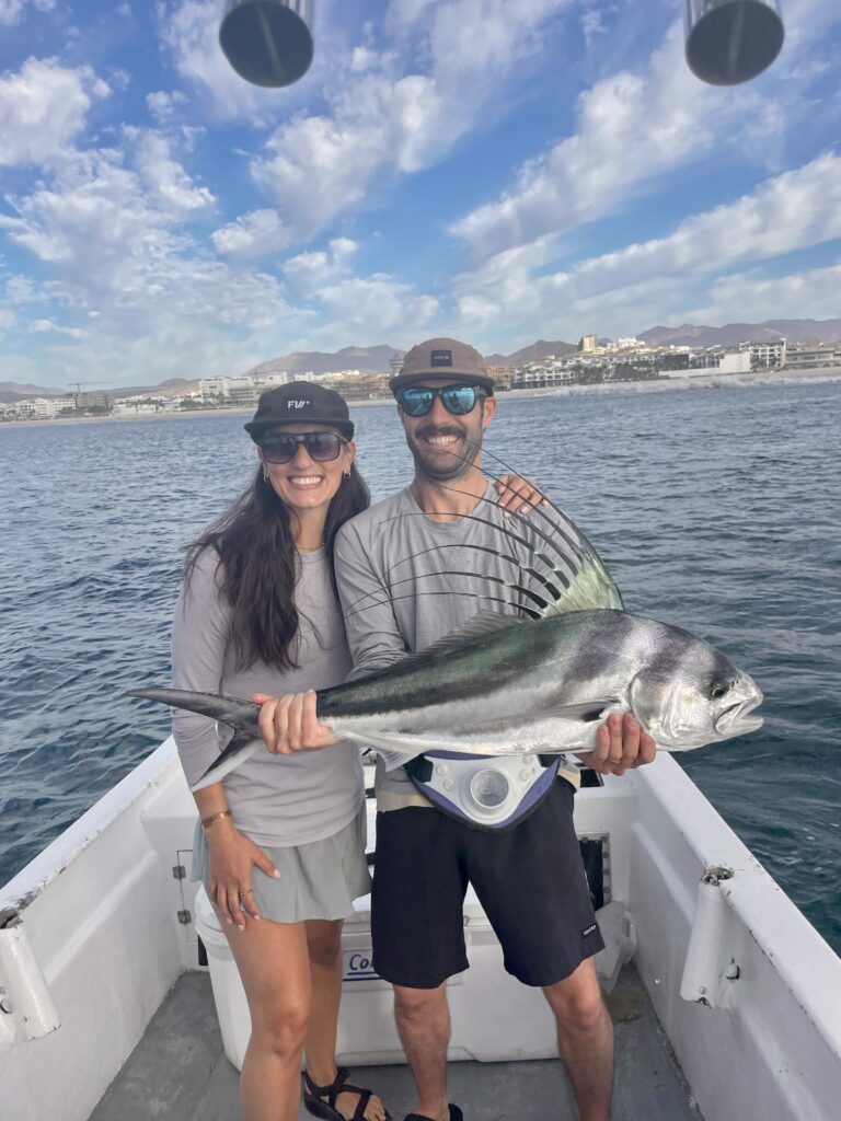 Angler holding a 25 lb roosterfish caught nearshore in San José del Cabo