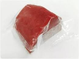Frozen fish fillets packed in a cooler for travel from Los Cabos
