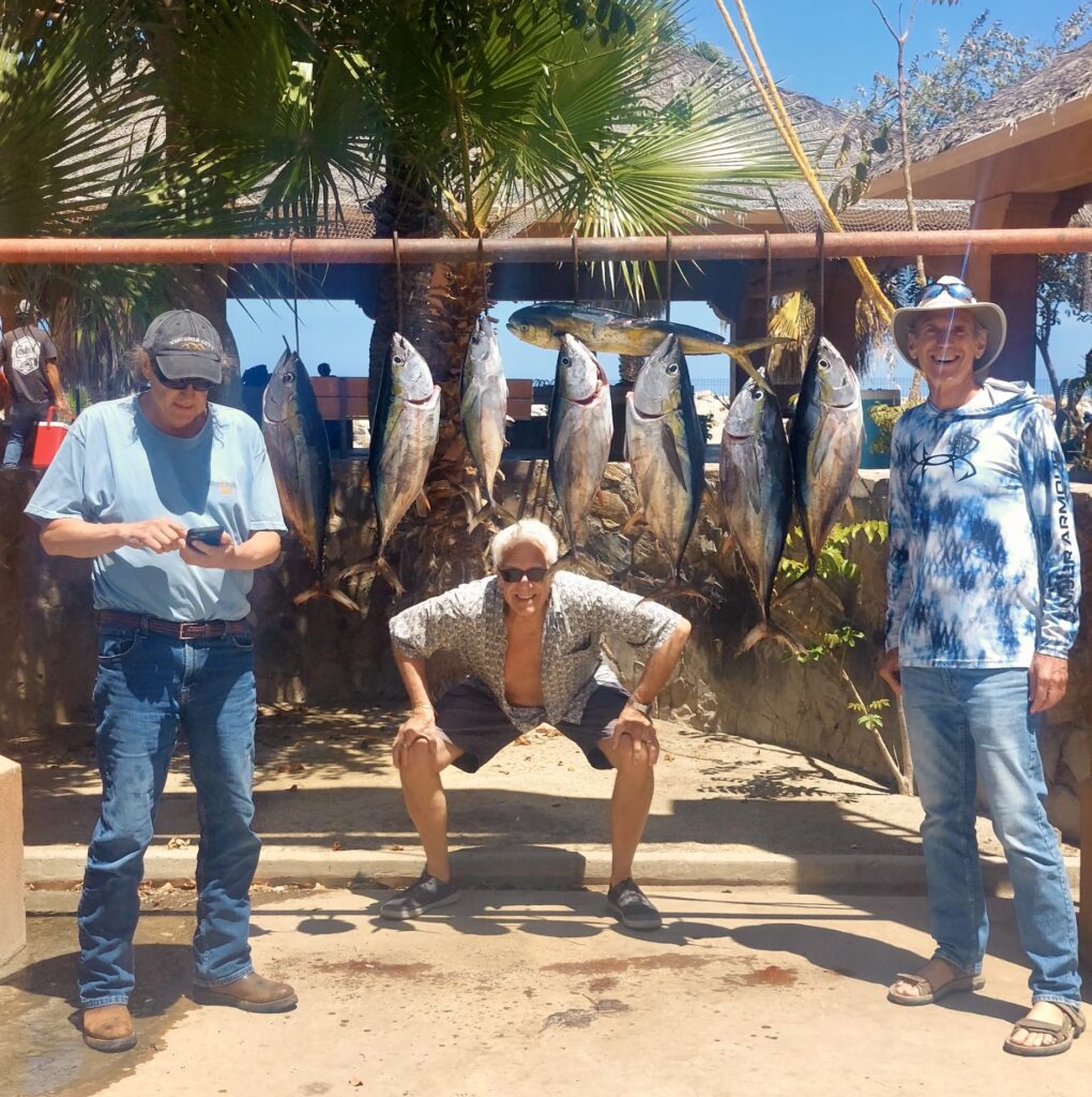 Captain presenting a nice reef catch aboard Daliken Sportfishing