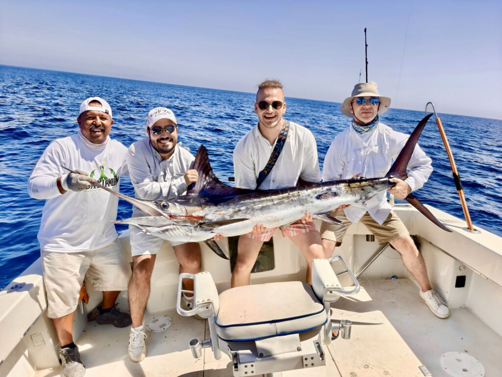 Angler releasing a striped marlin off the coast of San José del Cabo with Daliken Sportfishing