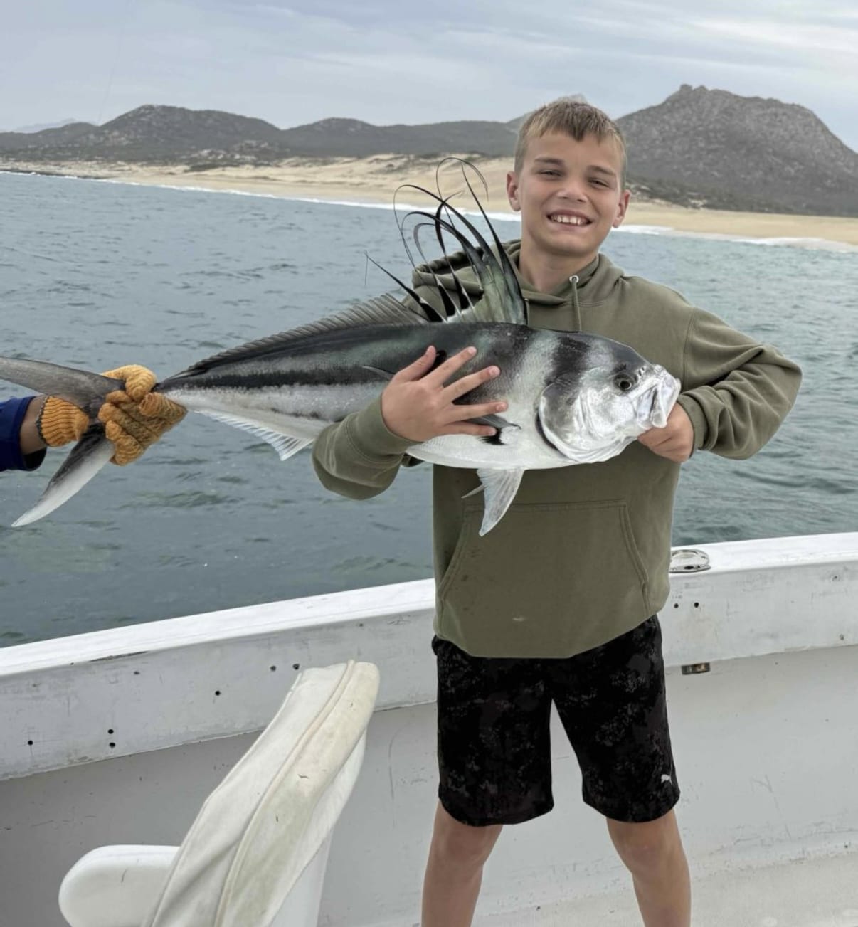 Roosterfish on deck after nearshore fishing in Los Cabos