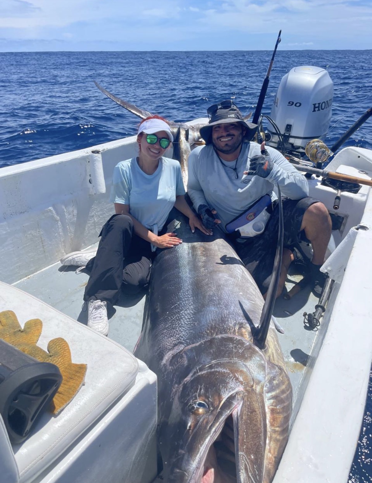 Clients on Super Panga 23ft with Black Marlin