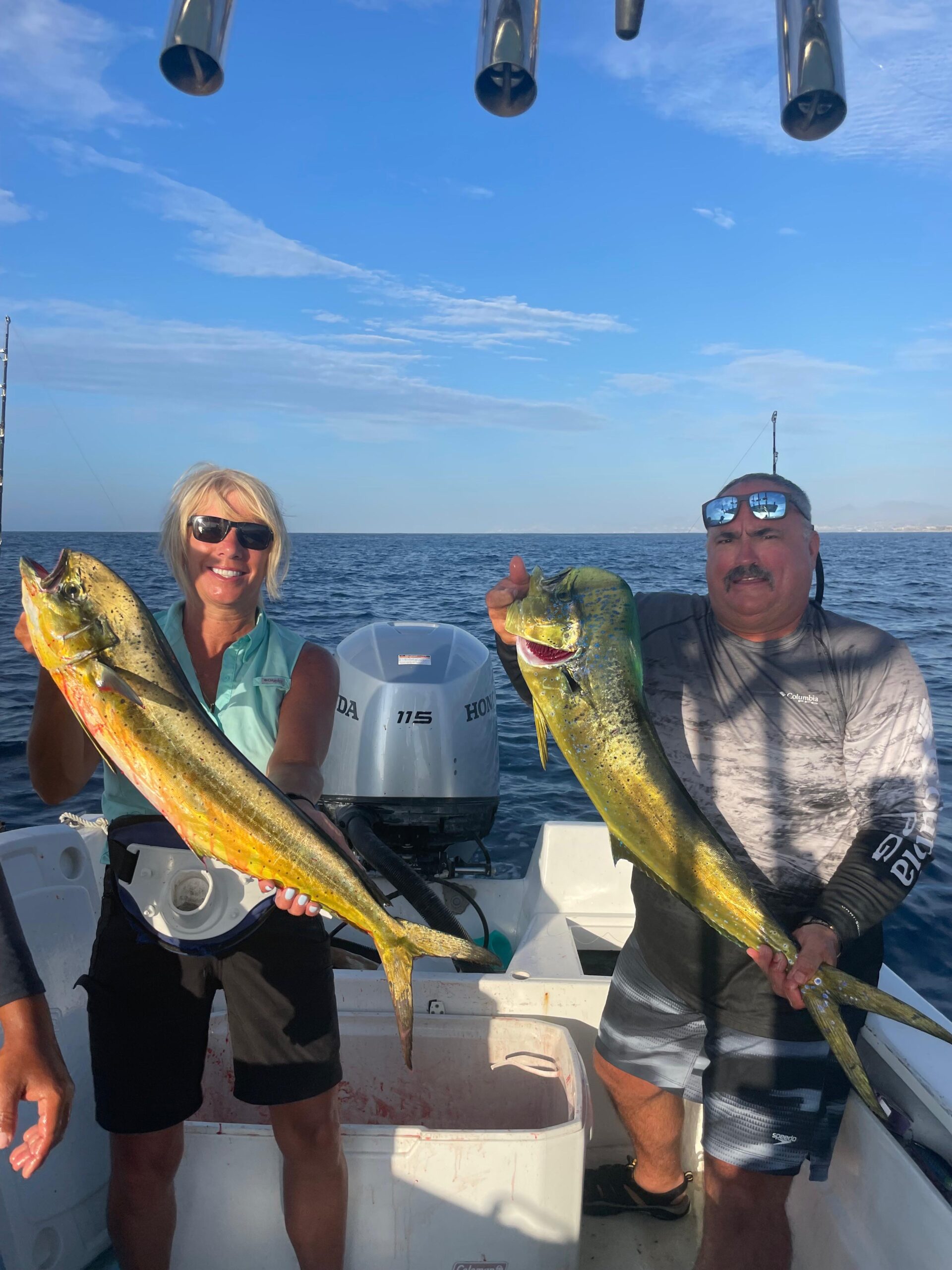 Happy clients with mahi mahi (dorado) in Los Cabos