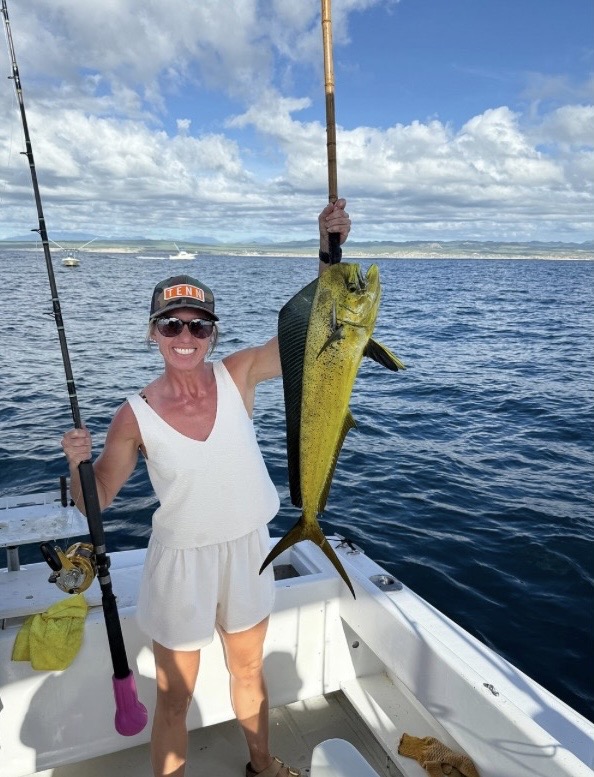 Client with dorado mahi mahi