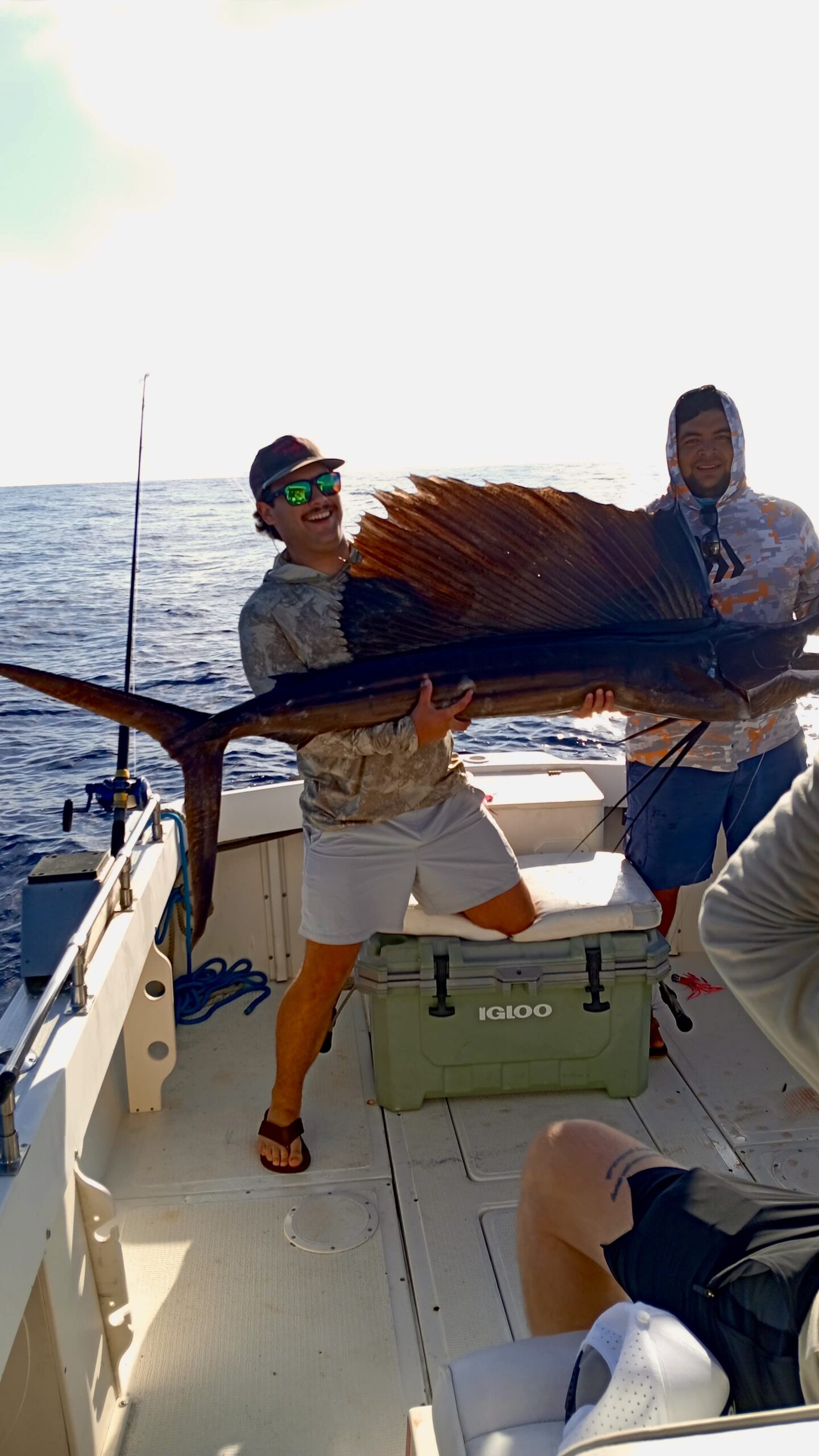 Client with a sailfish release aboard the 28 ft boat in San José del Cabo