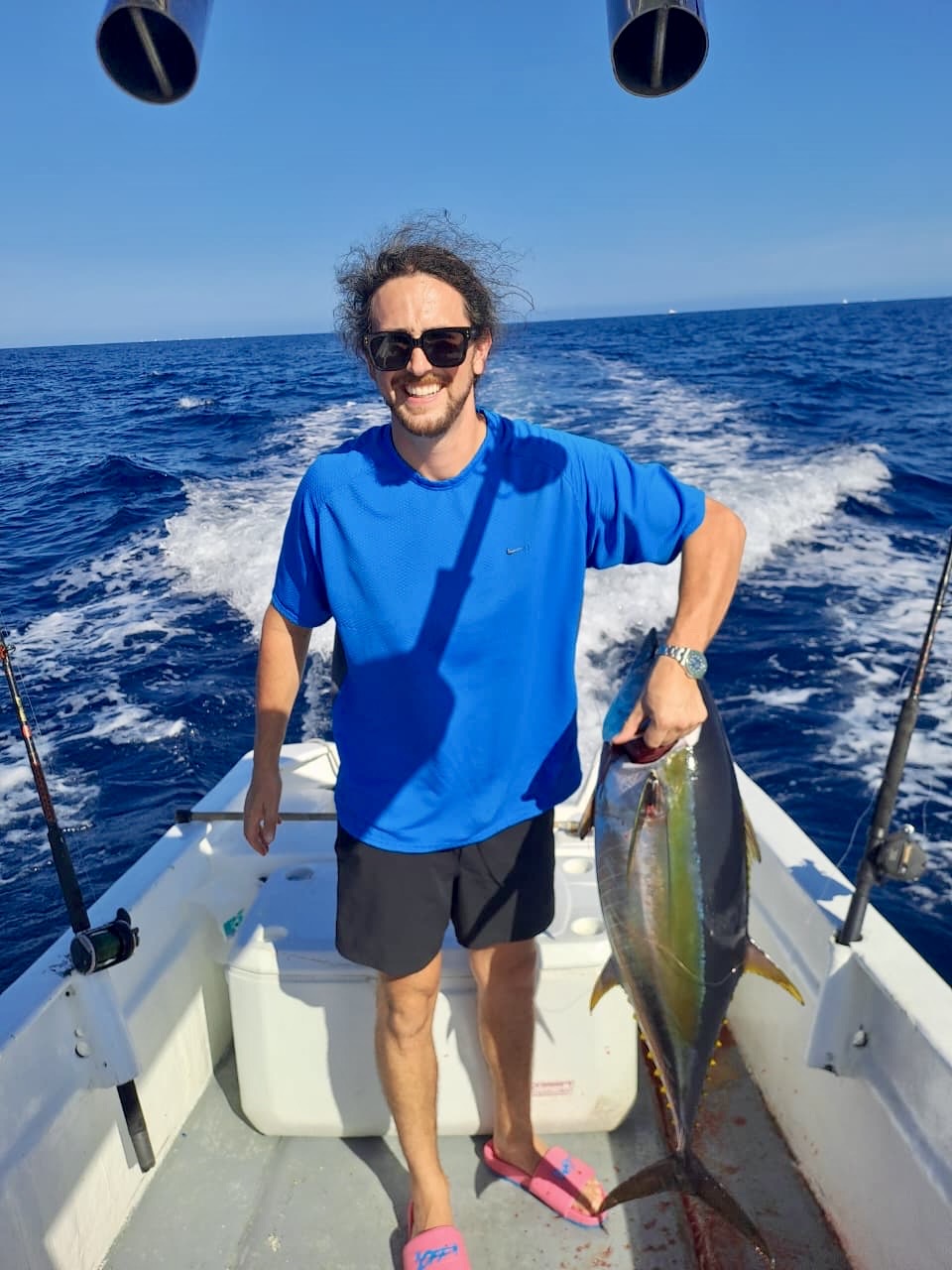Clients holding tunas aboard the 23 ft Super Panga in San José del Cabo