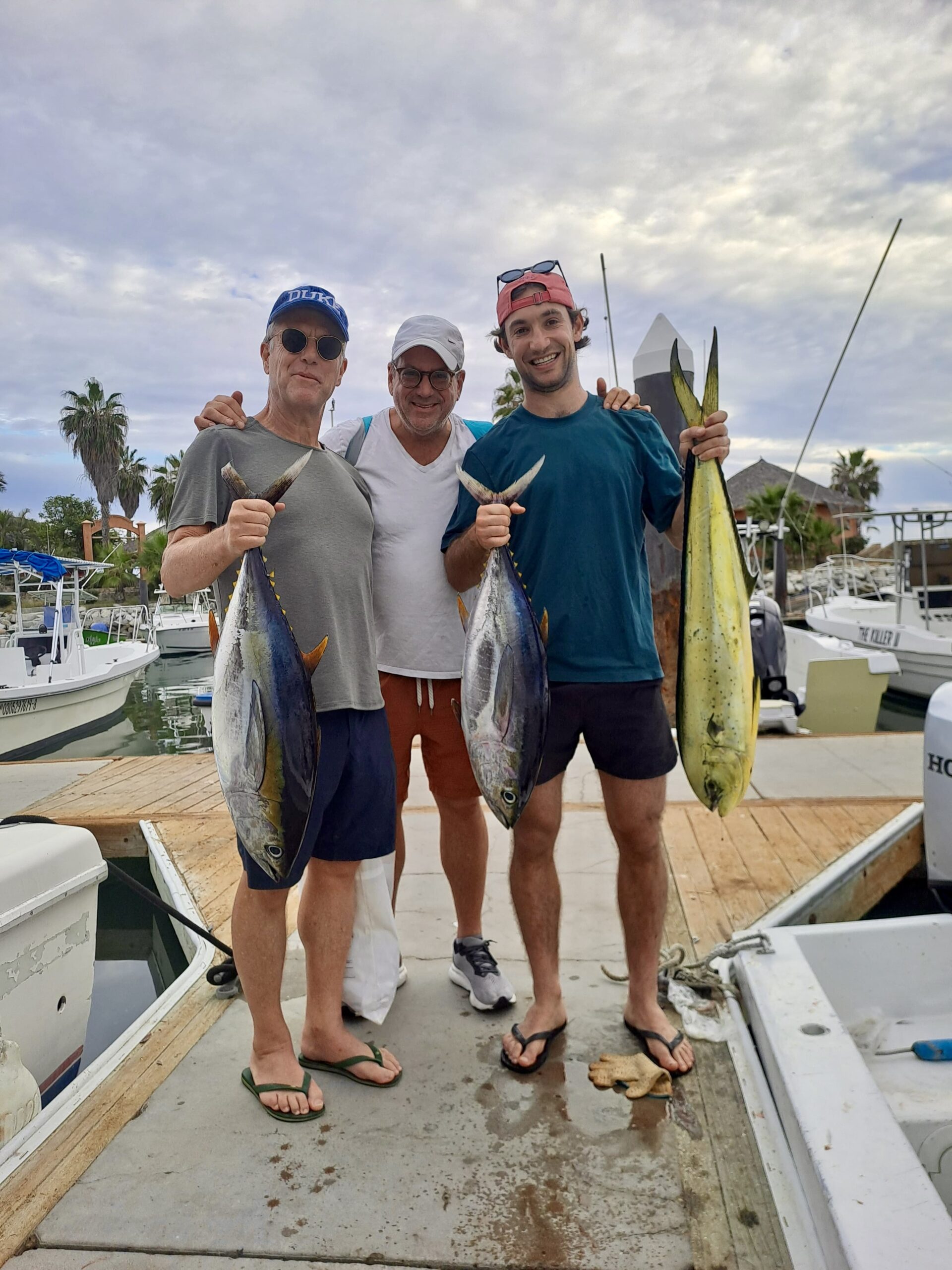 Happy angler holding a yellowfin tuna caught near San José del Cabo with Daliken Sportfishing