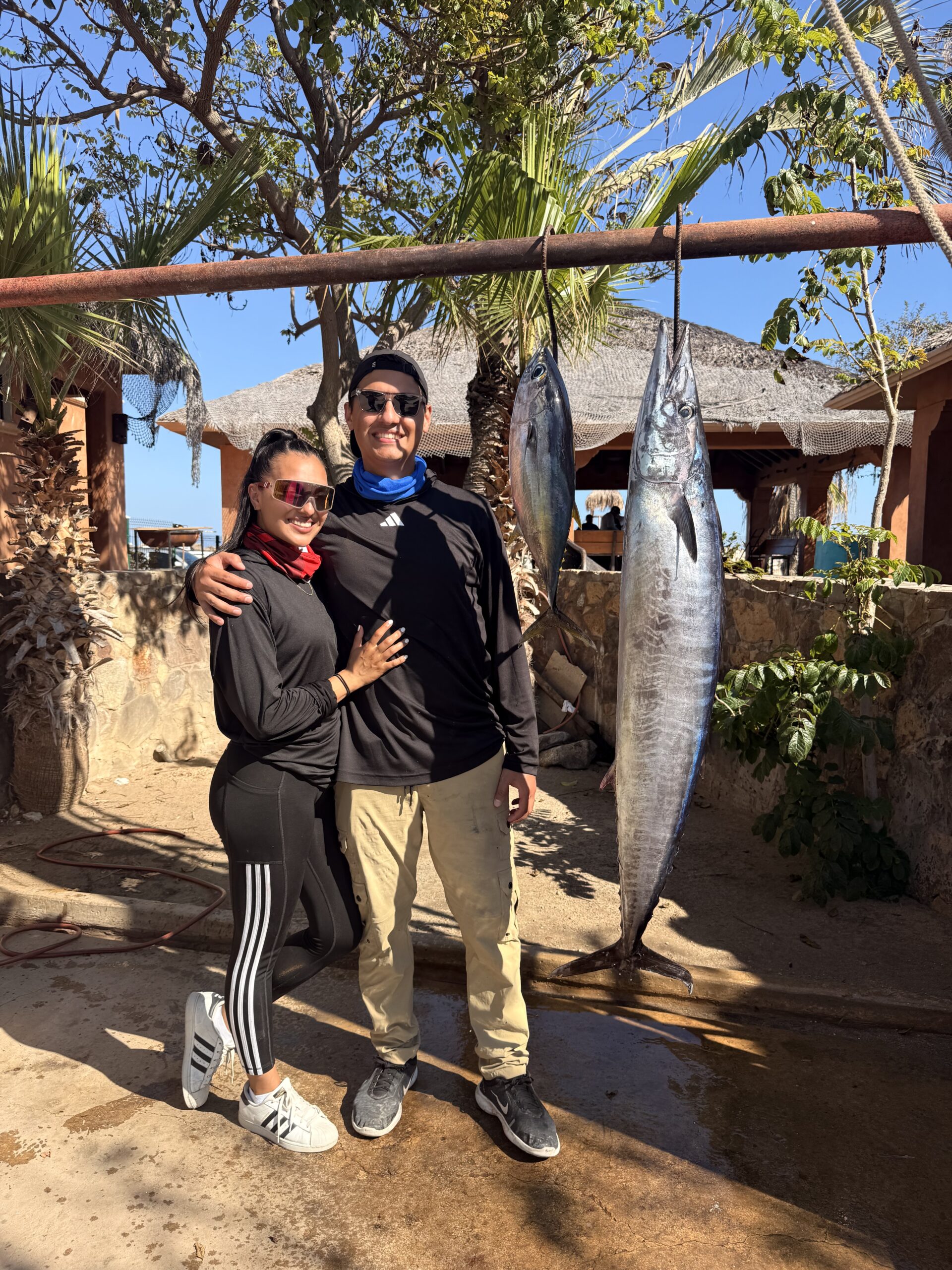 Client holding wahoo aboard panga in Sea of Cortez