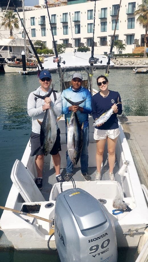 Group of anglers with multiple yellowfin tuna on the dock with Daliken Sportfishing