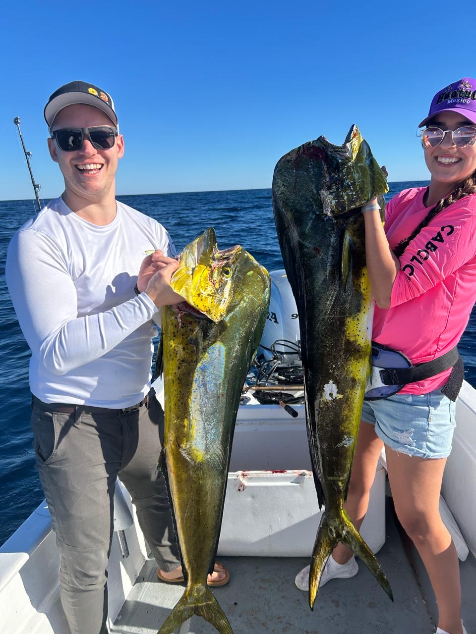 Family-friendly fishing photo with mahi mahi dorado catch in Los Cabos with Daliken Sportfishing
