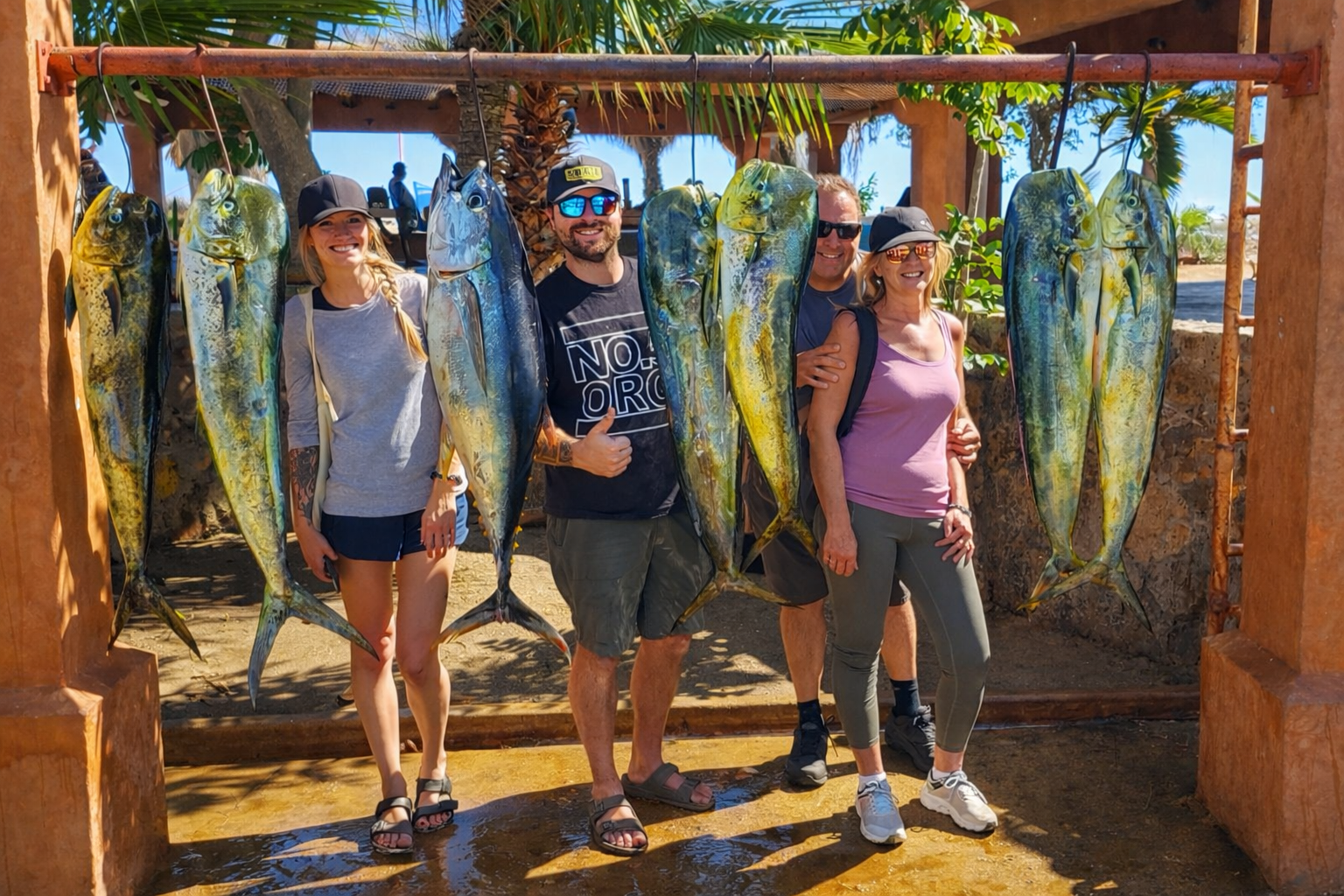 Daliken Sportfishing client holding fresh mahi mahi catch in San Jose del Cabo fishing report