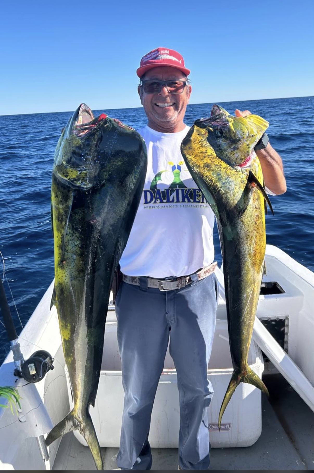 Angler holding a bright dorado mahi mahi on board in San José del Cabo, Daliken Sportfishing fish report