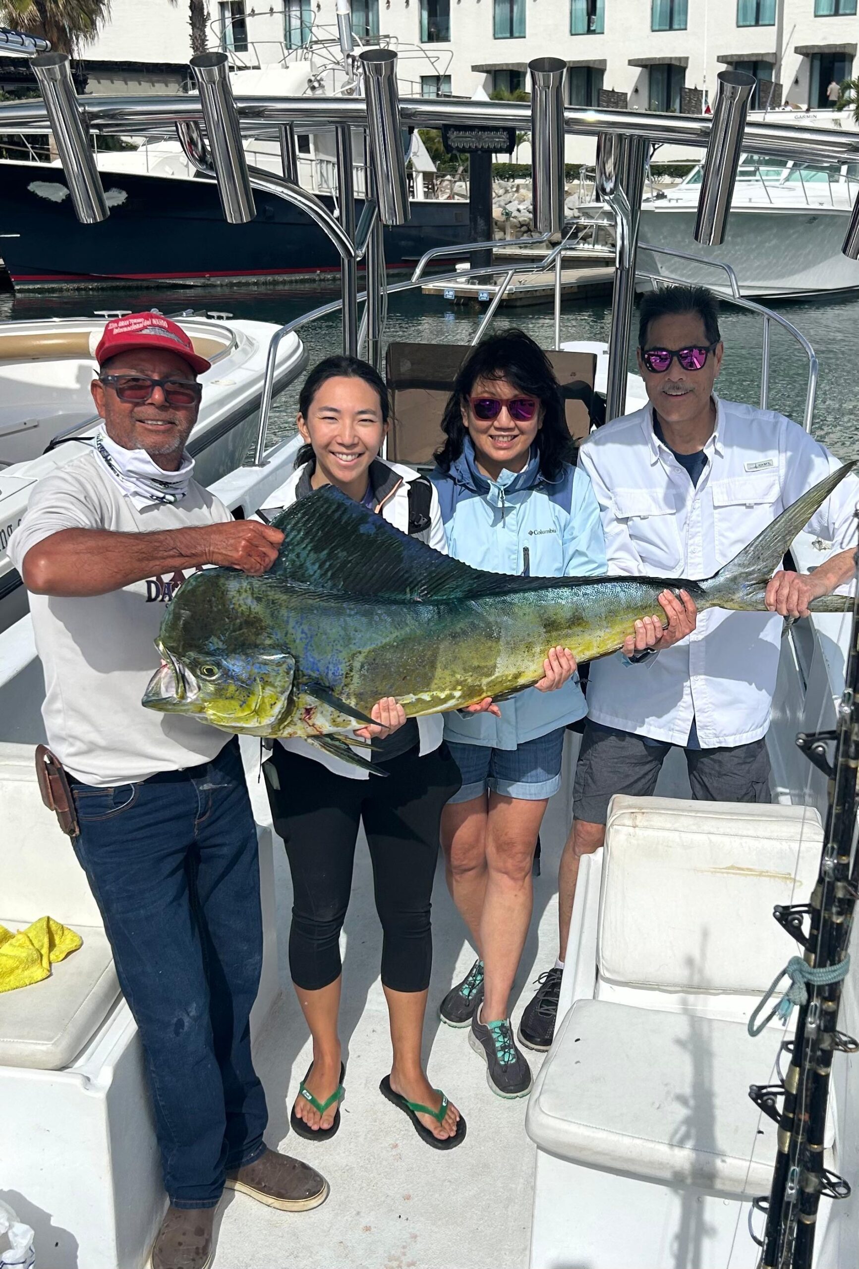 Happy guests with mahi mahi on a private fishing trip near San Jose del Cabo