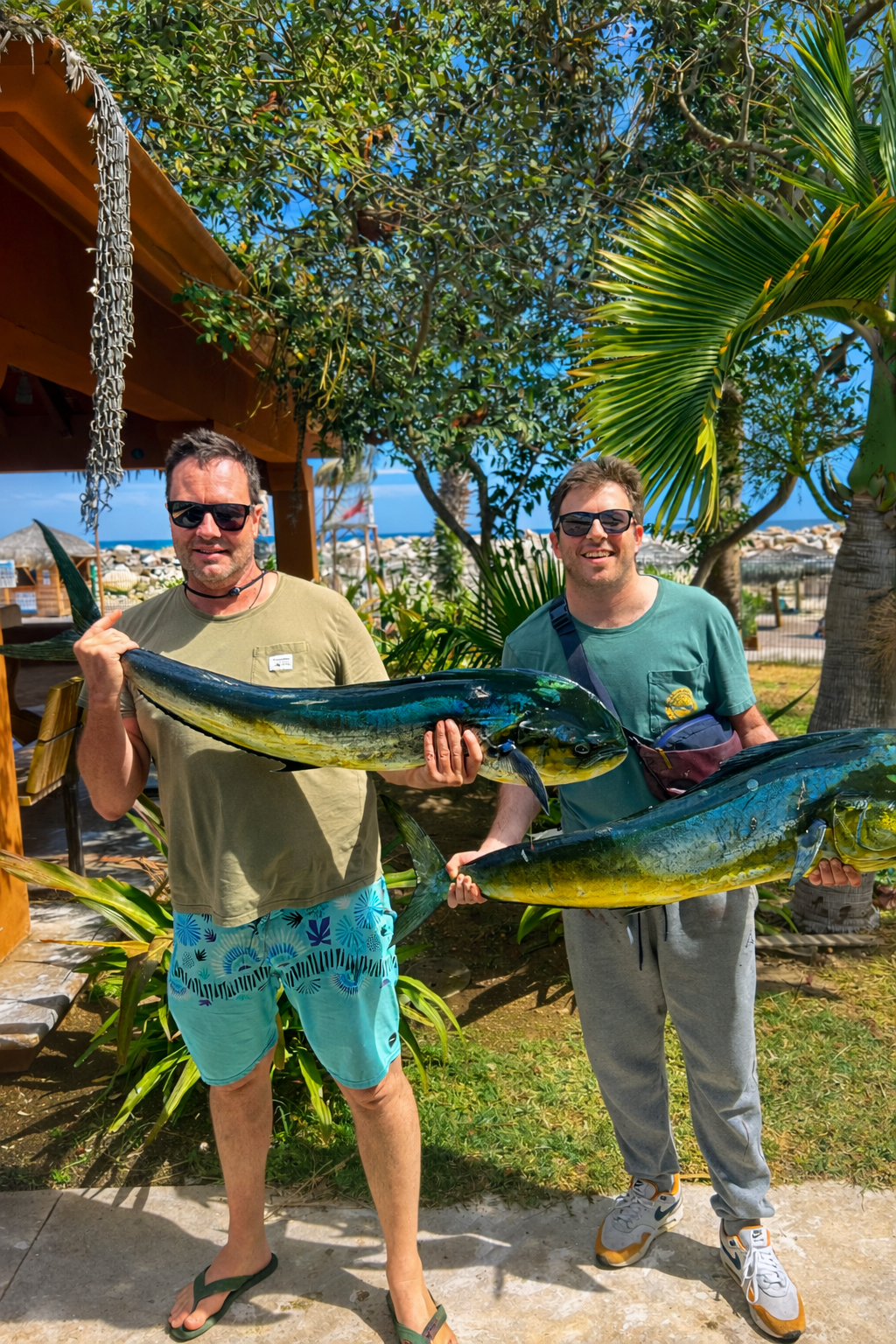Angler holding a fresh mahi mahi during a private fishing charter in San Jose del Cabo with Daliken Sportfishing