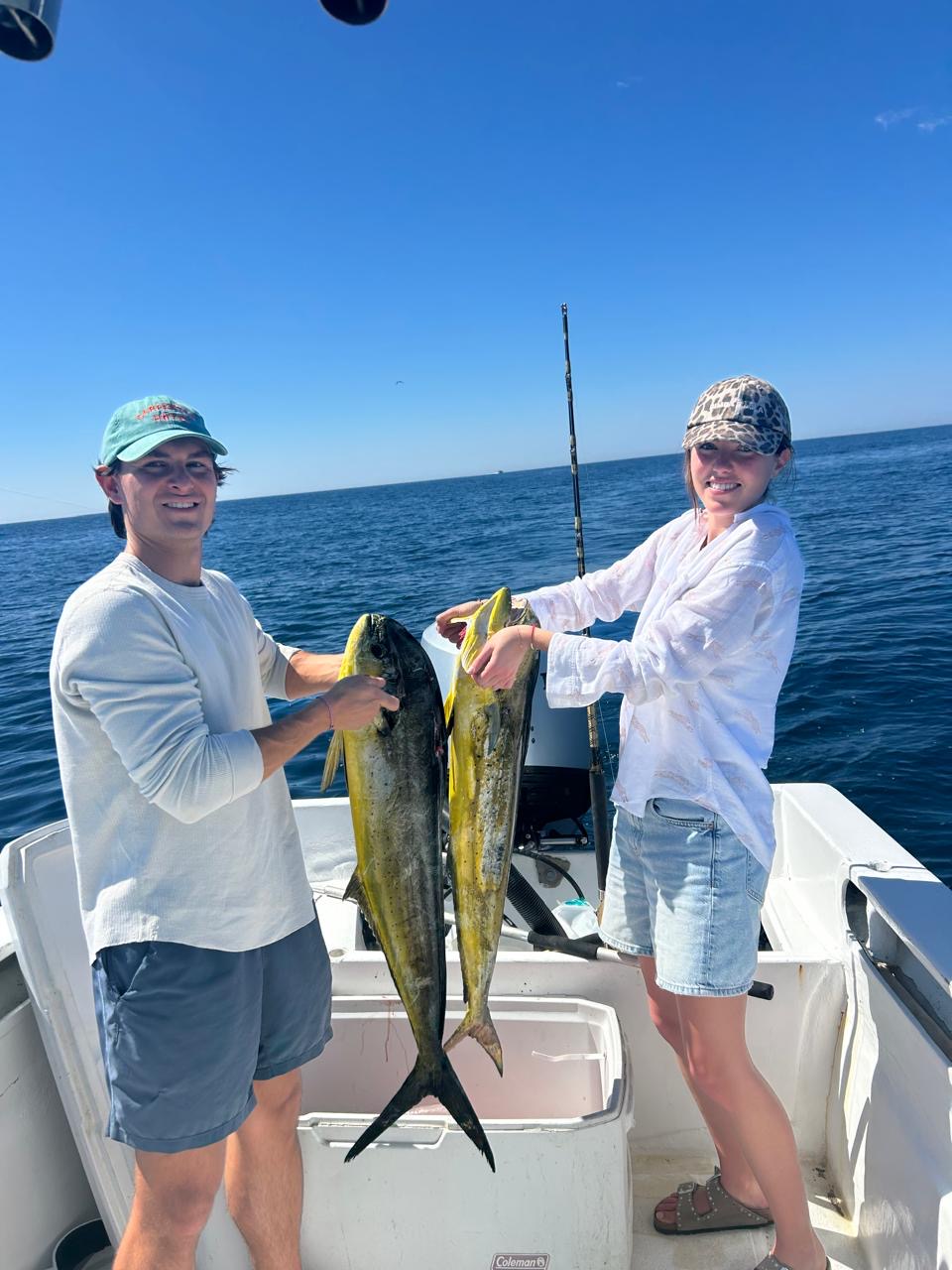 Private charter fishing guest holding fish in San Jose del Cabo