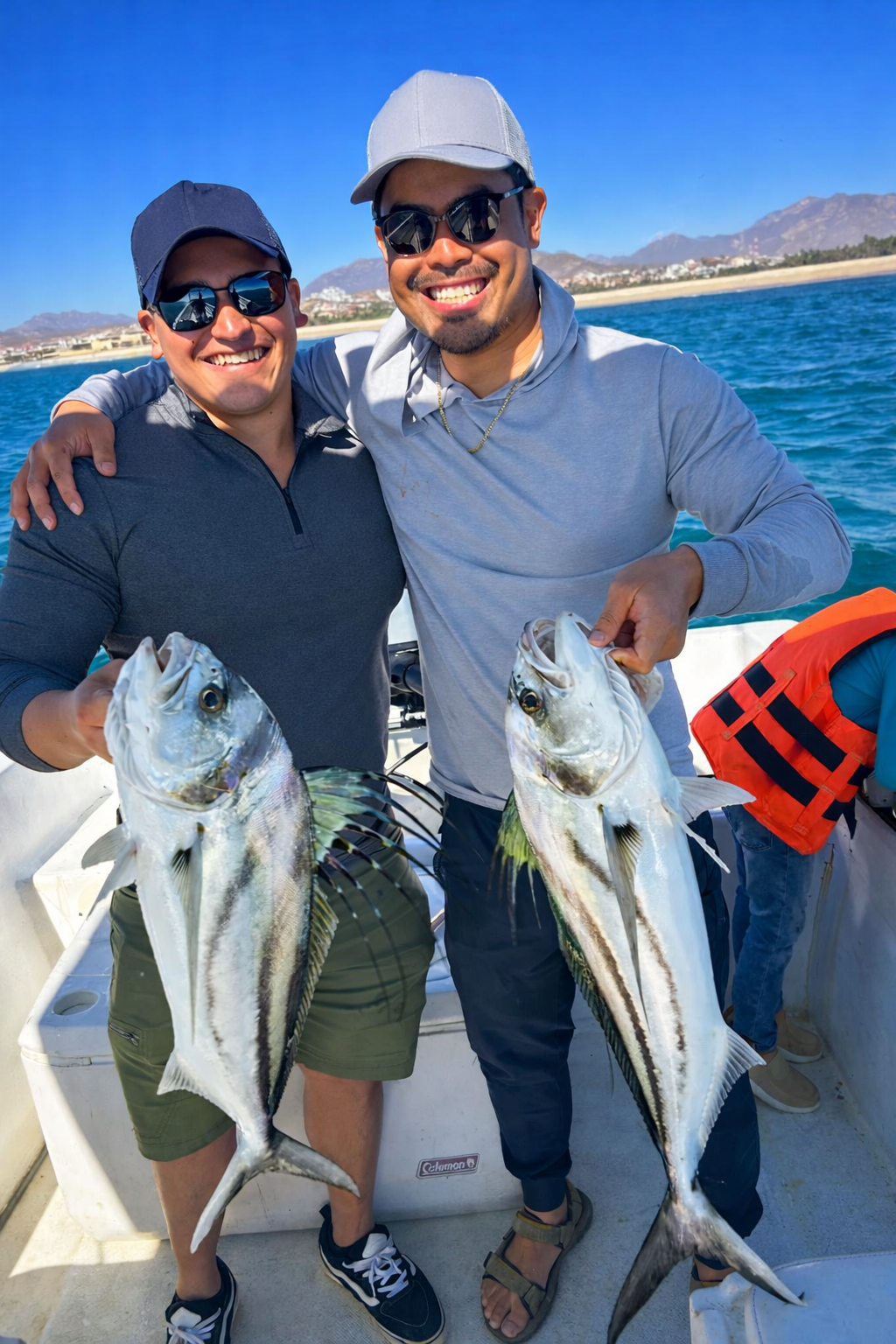 Happy guests aboard Daliken Sportfishing private charter San José del Cabo