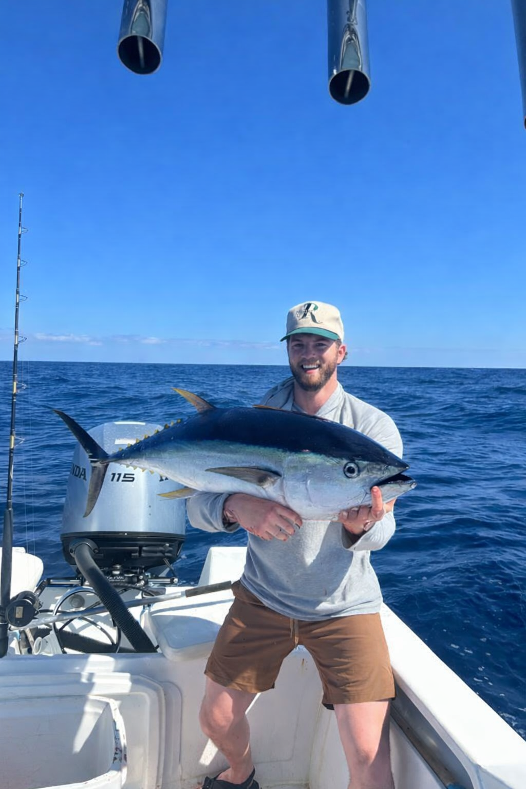 Offshore fishing clients in San Jose del Cabo with successful tuna catch on a private charter