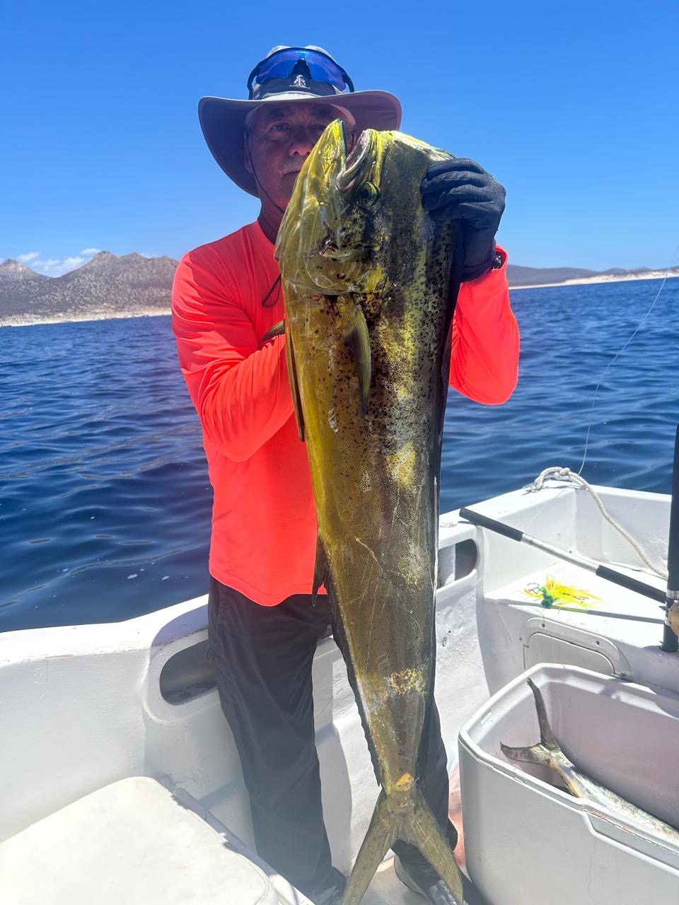 Happy Daliken Sportfishing client with catch — San José del Cabo private charter