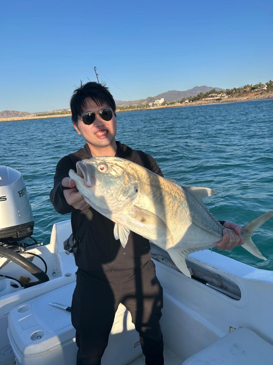 Daliken Sportfishing client trophy catch San Jose del Cabo private panga charter east wind season