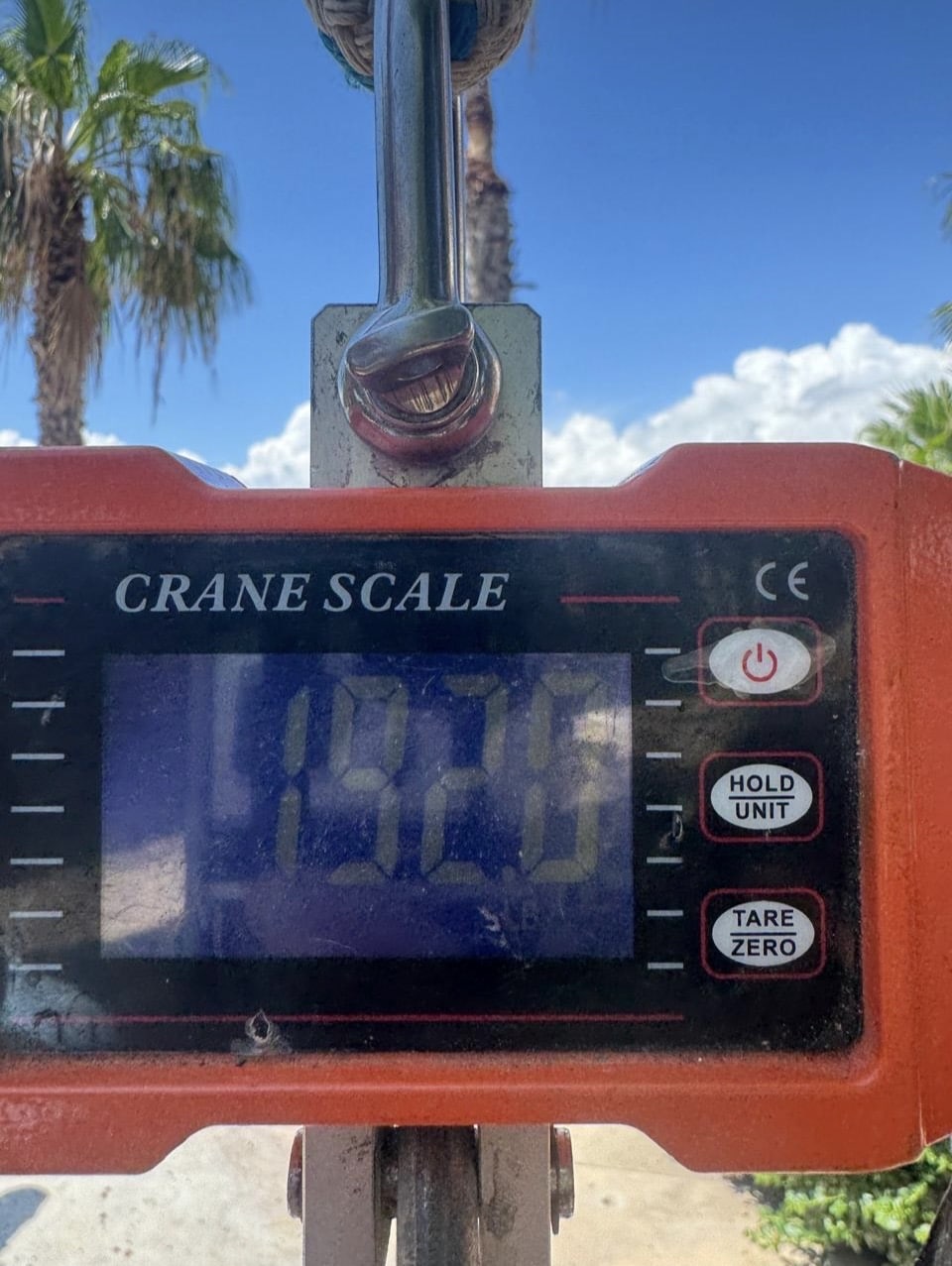 Crane scale showing the weight of a 192 pound yellowfin tuna at Puerto Los Cabos Marina